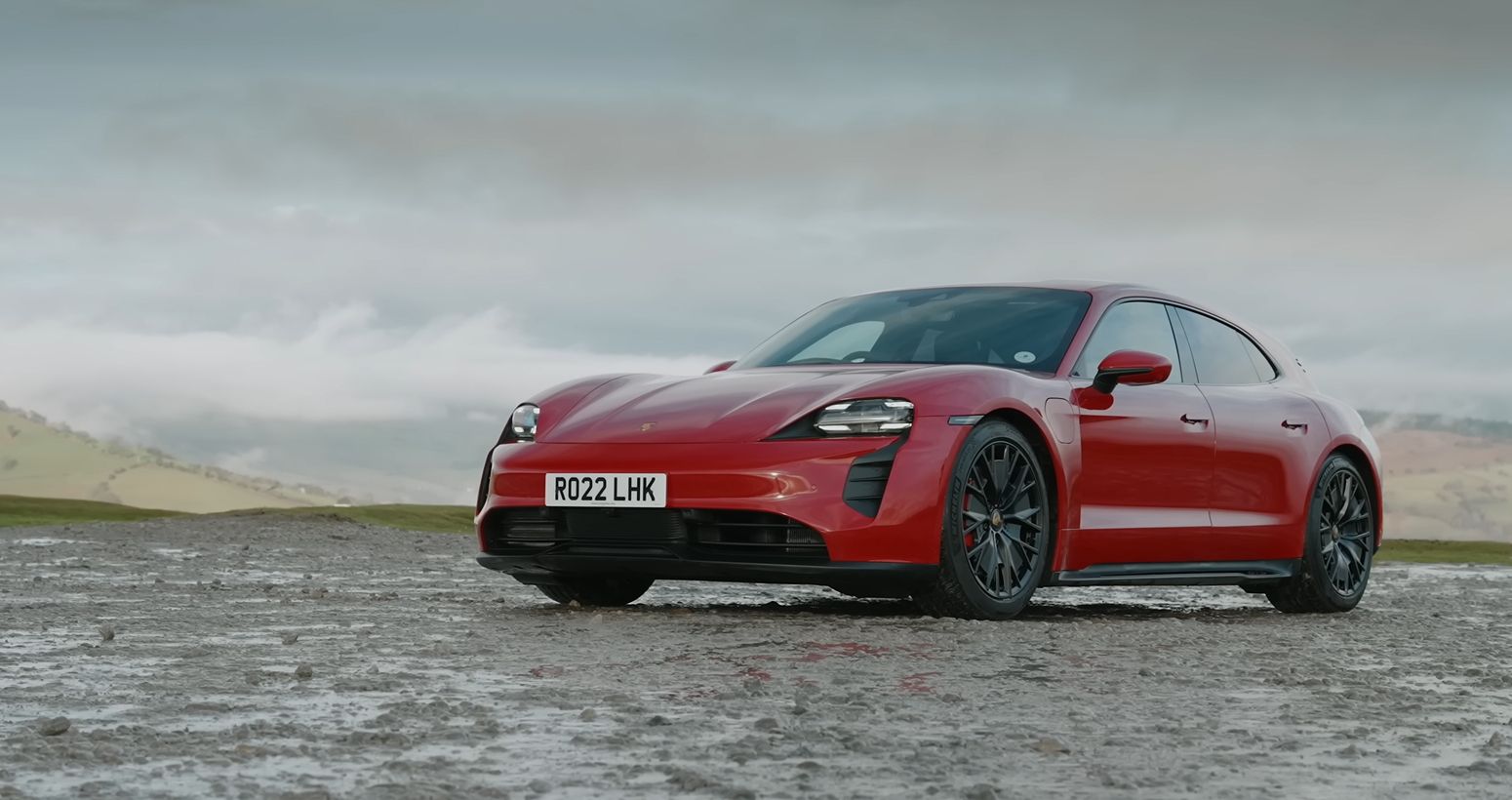 Red Porsche Taycan GTS front-side