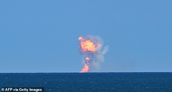 Starship's Super Heavy Booster splashes down for a water landing off the coast of, Texas, on its sixth flight test on November 19, 2024. SpaceX aborted an attempt to catch the first stage booster of its Starship megarocket in the "chopstick" arms of its launch tower, opting instead for an ocean splashdown, a live feed showed November 19. The hitch came as President-elect Donald Trump joined SpaceX chief Elon Musk at the company's Starbase in Boca Chica, Texas to watch the test flight, the latest sign of the budding bromance between the two billionaires. (Photo by CHANDAN KHANNA / AFP) (Photo by CHANDAN KHANNA/AFP via Getty Images)